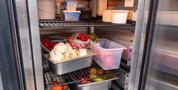 Refrigerator,Of,Restaurant,With,Food.,Vegetables,In,Restaurant,Refrigerator.,Containers