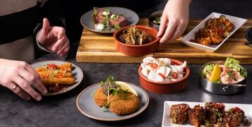 Selection,Of,Sharing,Starters,Tapas,And,Entrees,Looking,Tasty,Including